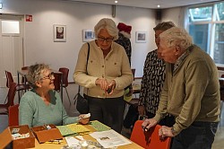 De portemonnee moet getrokken worden.